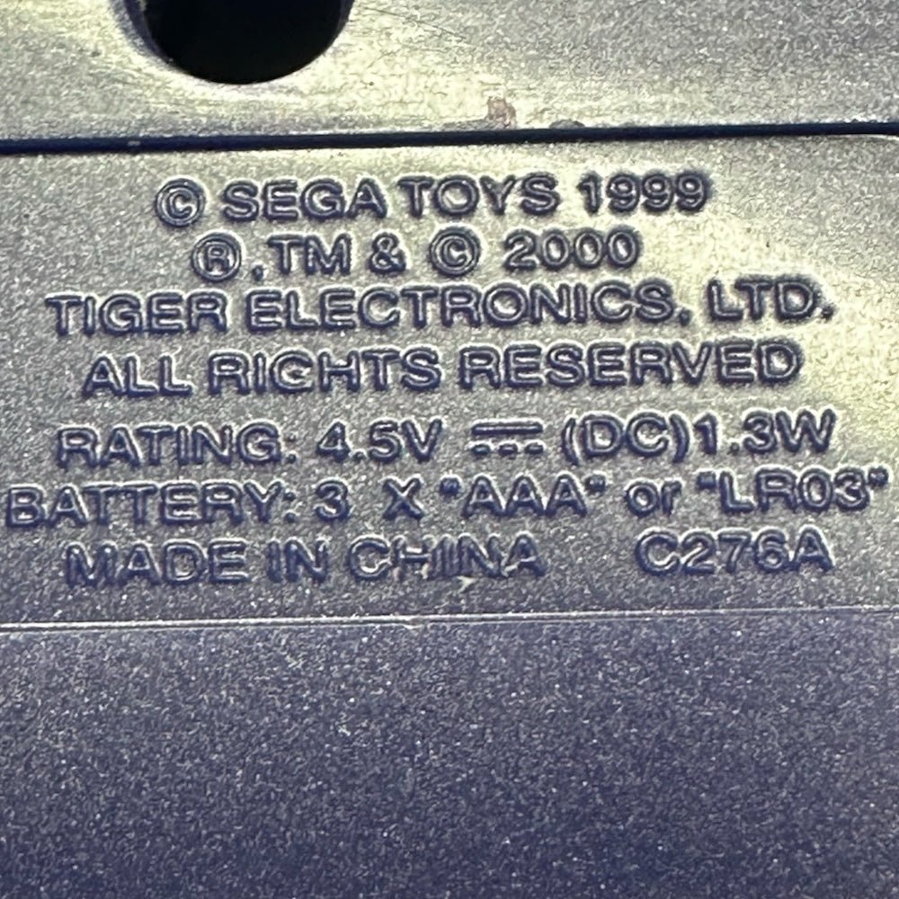 Tiger Electronics Robot Poo-Chi REPLACEMENT battery cover Purple 2000 | Finer Things Resale