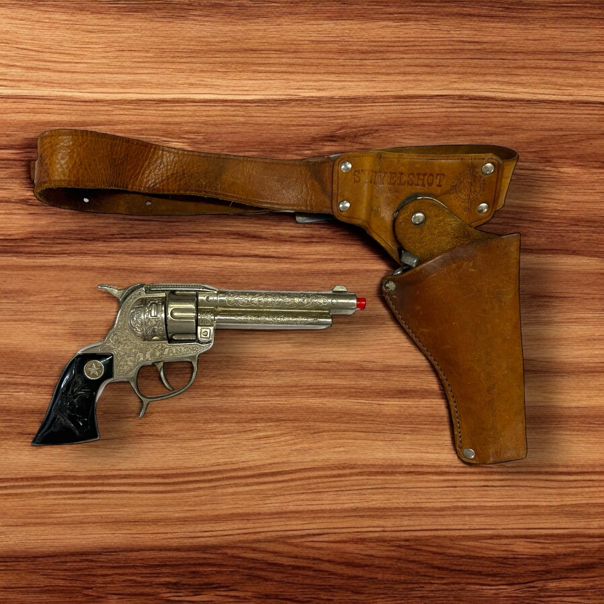 Hubley Texan Cap Gun with Mattel Swivelshot leather holster VINTAGE 1950'S | Finer Things Resale