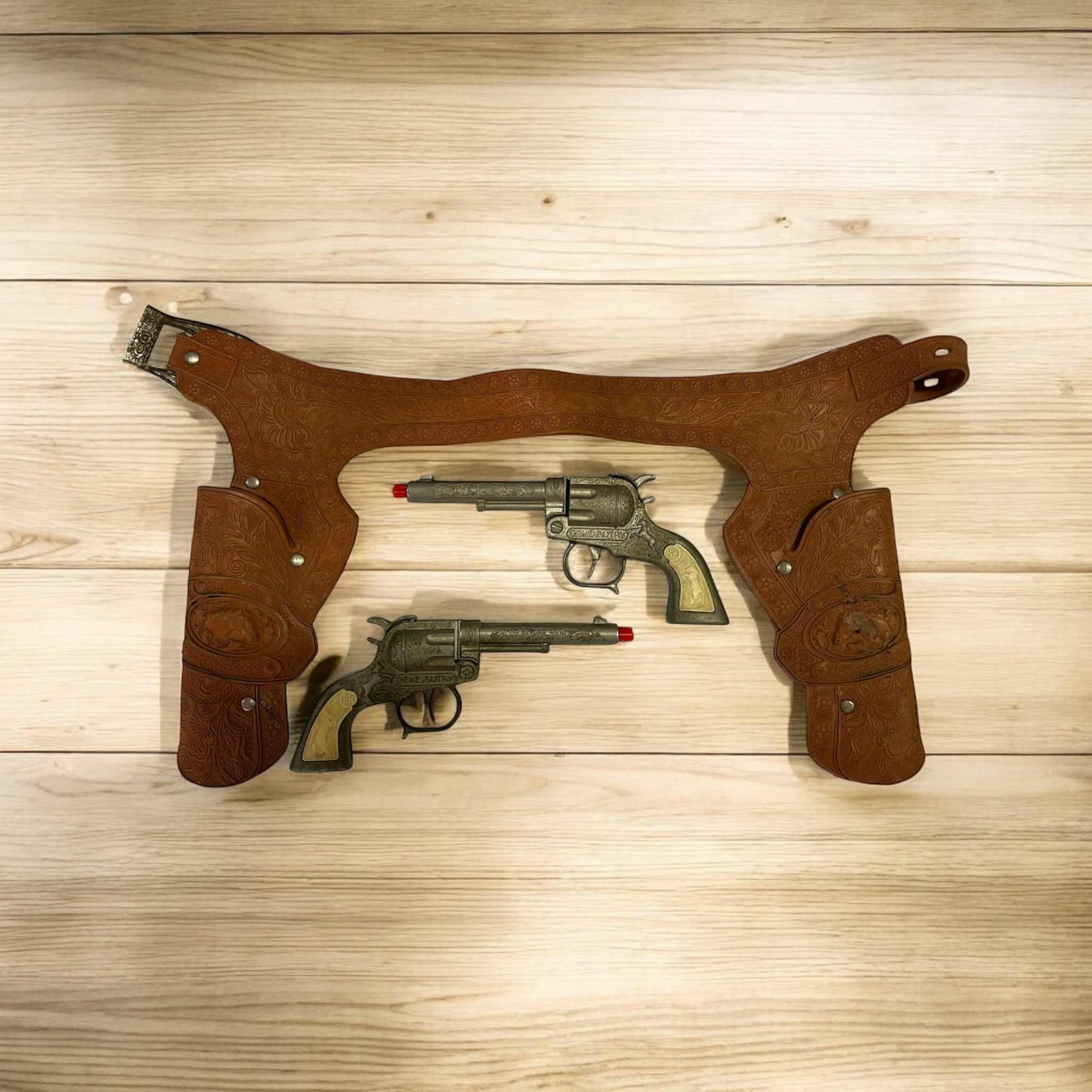 Buzz Henry Gene Autry 2 cap gun pistols with dura-hide holster VINTAGE 1950'S | Finer Things Resale